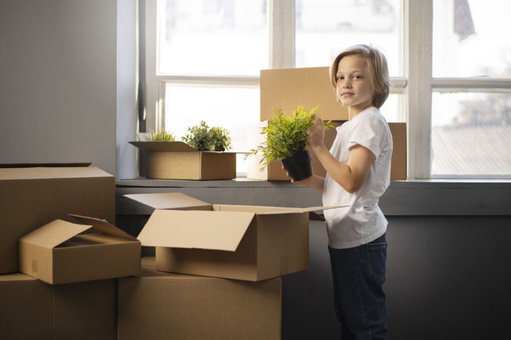 A kid organizing and packing sustainably using reusable containers