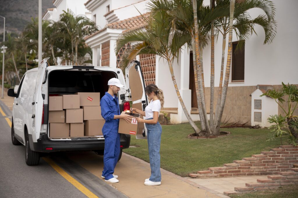 Professional movers loading items into a moving truck